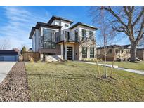 Modern two-story home with landscaped lawn and walkway at 2650 Zenobia, Denver, CO 80212