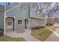 Front walkway and entrance of a two-story condo at 1915 S Balsam St, Lakewood, CO 80227