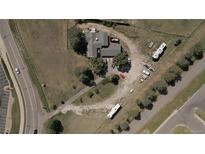 Aerial view of a house with large lot and RV parking at 6803 S Liverpool St, Centennial, CO 80016