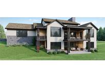 Luxury home with stone accents and patio at 6192 Oxford Peak Ln, Castle Rock, CO 80108