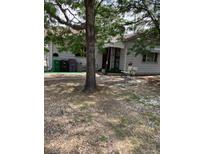 Cozy ranch home with a small front yard at 420 E 45Th Ave, Denver, CO 80216