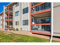 Exterior view of apartment building with balconies at 2715 W 86Th Ave # 21, Westminster, CO 80031