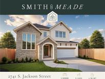 Two-story home with stone and white siding at 2741 S Jackson St, Denver, CO 80210