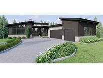 Modern home exterior with two car garage at 6194 Oxford Peak Ln, Castle Rock, CO 80108