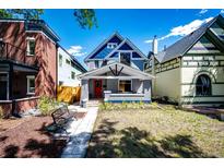 Charming craftsman home with gray exterior at 212 S Sherman St, Denver, CO 80209