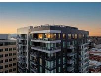 Modern high-rise building with city views and private balconies at 155 Steele St # 314, Denver, CO 80206