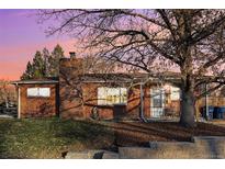 Brick ranch home with mature trees and landscaping at 5770 S Hickory St, Littleton, CO 80120