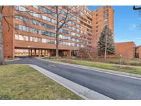 Brick building exterior with landscaping and parking at 1850 Folsom St # 411, Boulder, CO 80302