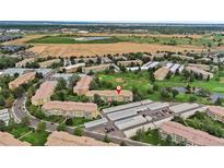 Aerial view of condo building and surrounding golf course at 650 S Alton Way # 5D, Denver, CO 80247