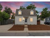 Charming cape cod home with a well-maintained front yard at 4835 Shoshone St, Denver, CO 80221