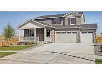 Two-story house with a two-car garage and front porch at 3492 N Highlands Creek Pkwy, Aurora, CO 80019