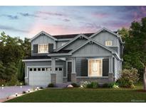 Two-story house with gray siding, a two-car garage, and landscaping at 9996 Racine St, Commerce City, CO 80022