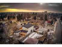 Aerial view of a modern home in a quiet residential neighborhood at 1080 Ivy St, Denver, CO 80220