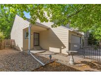 Cozy ranch-style home with landscaped yard and attached garage at 806 W Peakview Ave, Littleton, CO 80120