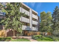 Condo building exterior with landscaping and walkway at 2227 Canyon Blvd # 253B, Boulder, CO 80302