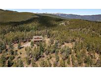 Mountaintop log home with stunning views and large deck at 6929 Weasel Way, Evergreen, CO 80439