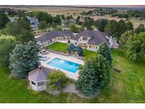 Luxury estate with pool and gazebo on 1.91 acres at 17575 E Kettle Pl, Centennial, CO 80016