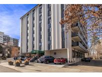 Exterior view of a modern apartment building with parking at 1265 Race St # 208, Denver, CO 80206