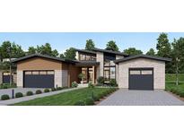 Modern two-story home with two-car garage and stone exterior at 8006 Trinity Peak Ln, Castle Rock, CO 80108