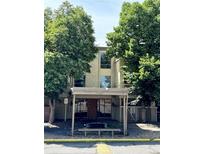 Front view of condo building with covered entryway at 1302 S Parker Rd # 226, Denver, CO 80231