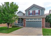 Two-story home with brick and siding accents at 934 Windom Peak Dr, Superior, CO 80027