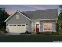 One-story craftsman home with gray siding and stone accents at 374 Josef Cir, Fort Lupton, CO 80621