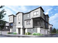 Modern three-story townhome with attached garage at 11940 Soprano Trl, Lone Tree, CO 80134