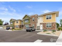 Modern building exterior with parking at 270 S Cherrywood Dr # 101, Lafayette, CO 80026