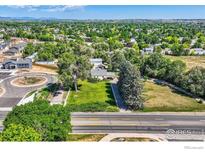 Wide aerial view of neighborhood with mountain views at 12027 Saint Vrain Rd, Longmont, CO 80504
