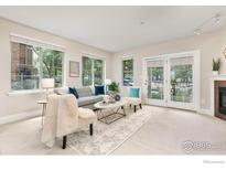 Bright and spacious living room with access to a patio or balcony at 1560 Milwaukee St # 140, Denver, CO 80206