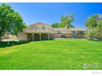 Ranch house with deck and large yard at 19150 E 195Th Ave, Hudson, CO 80642