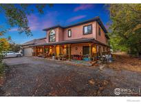Two-story house exterior with front porch and landscaping at 1600 17Th Ave, Longmont, CO 80501