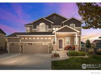 Two-story house with two-car garage at 514 Mount Rainier St, Berthoud, CO 80513