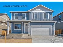 Two-story home with gray siding and white trim at 4210 Sandstone Dr, Mead, CO 80504