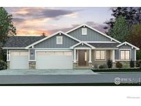 Two-story home with gray siding, three-car garage, and landscaping at 24125 E 35Th Dr, Aurora, CO 80019