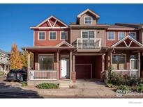 Two story red brick townhome with balcony at 818 S Terry St # 85, Longmont, CO 80501