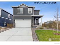 New construction home with two-car garage at 1916 Pinnacle Ave, Lochbuie, CO 80603