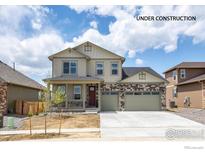 New construction two-story home with attached two-car garage at 1815 Chaffee Crest Dr, Berthoud, CO 80513