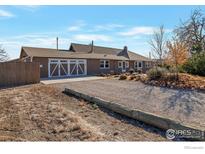 Spacious house with a large driveway and three-car garage at 2981 W 144Th Ave, Broomfield, CO 80023
