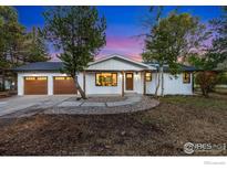 Stunning ranch home with modern exterior and two-car garage at 12360 N 75Th St, Longmont, CO 80503