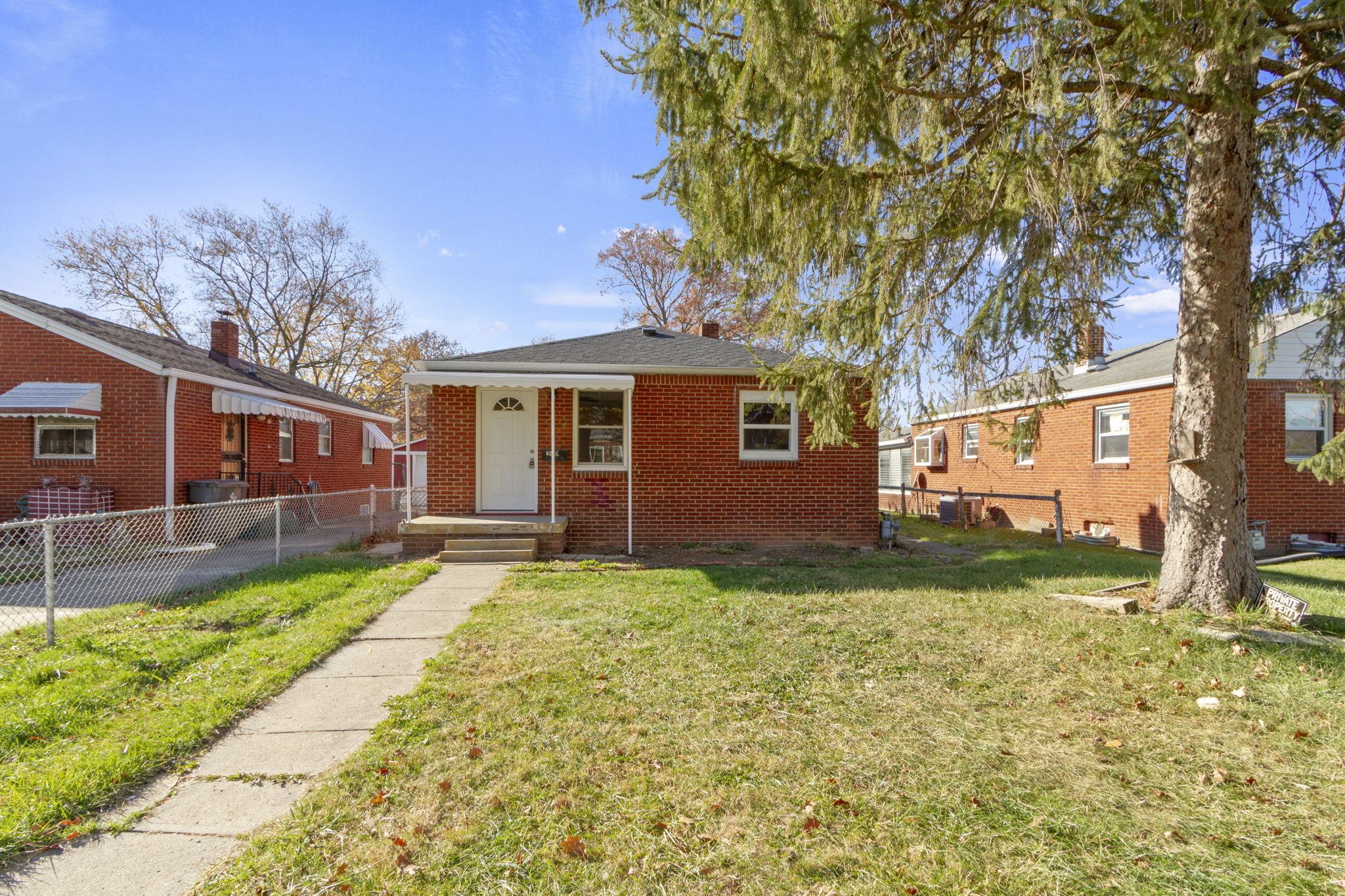 Photo one of 340 S Sheridan Ave Indianapolis IN 46219 | MLS 21952977