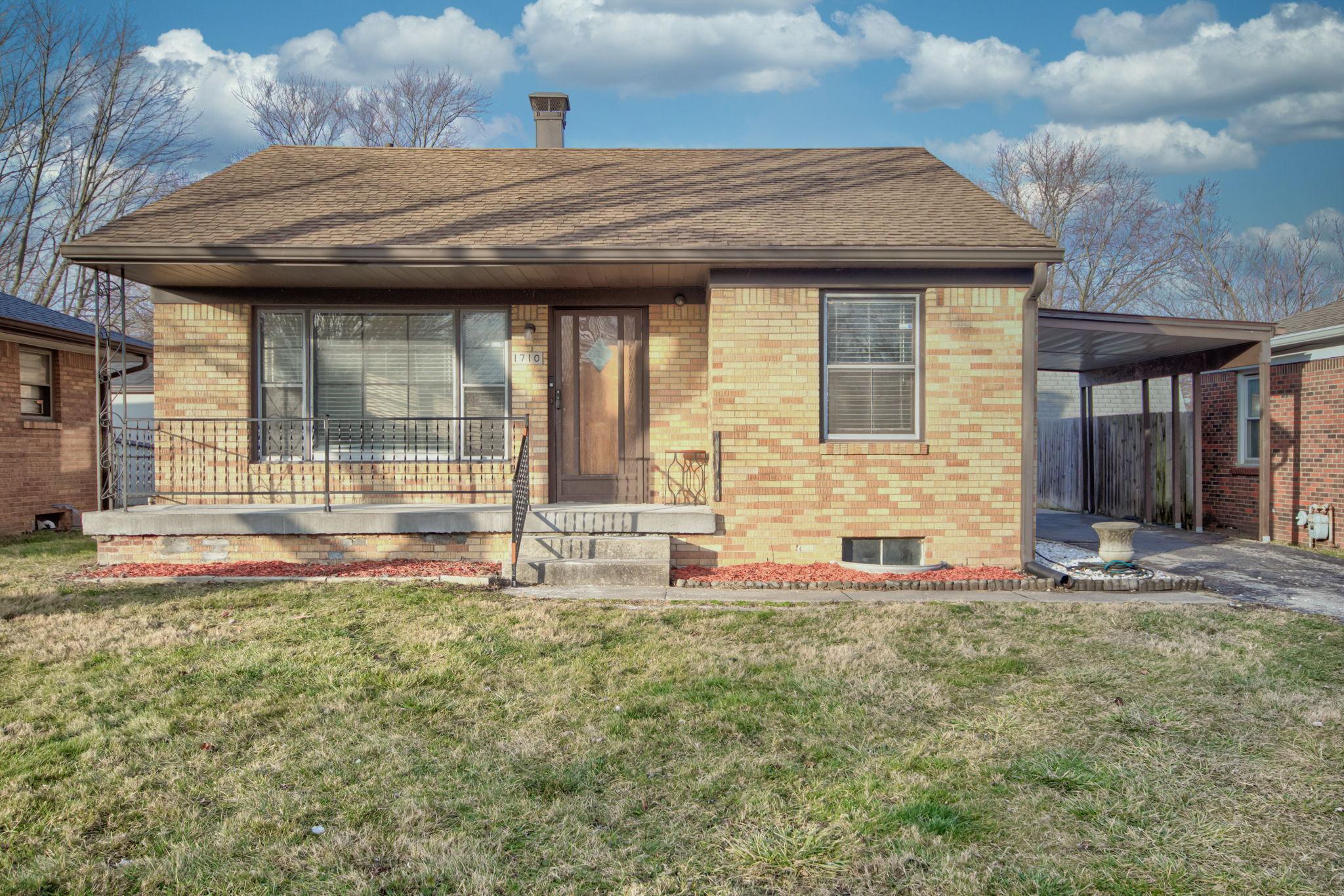 Photo one of 1710 N Coolidge Ave Indianapolis IN 46219 | MLS 21959594