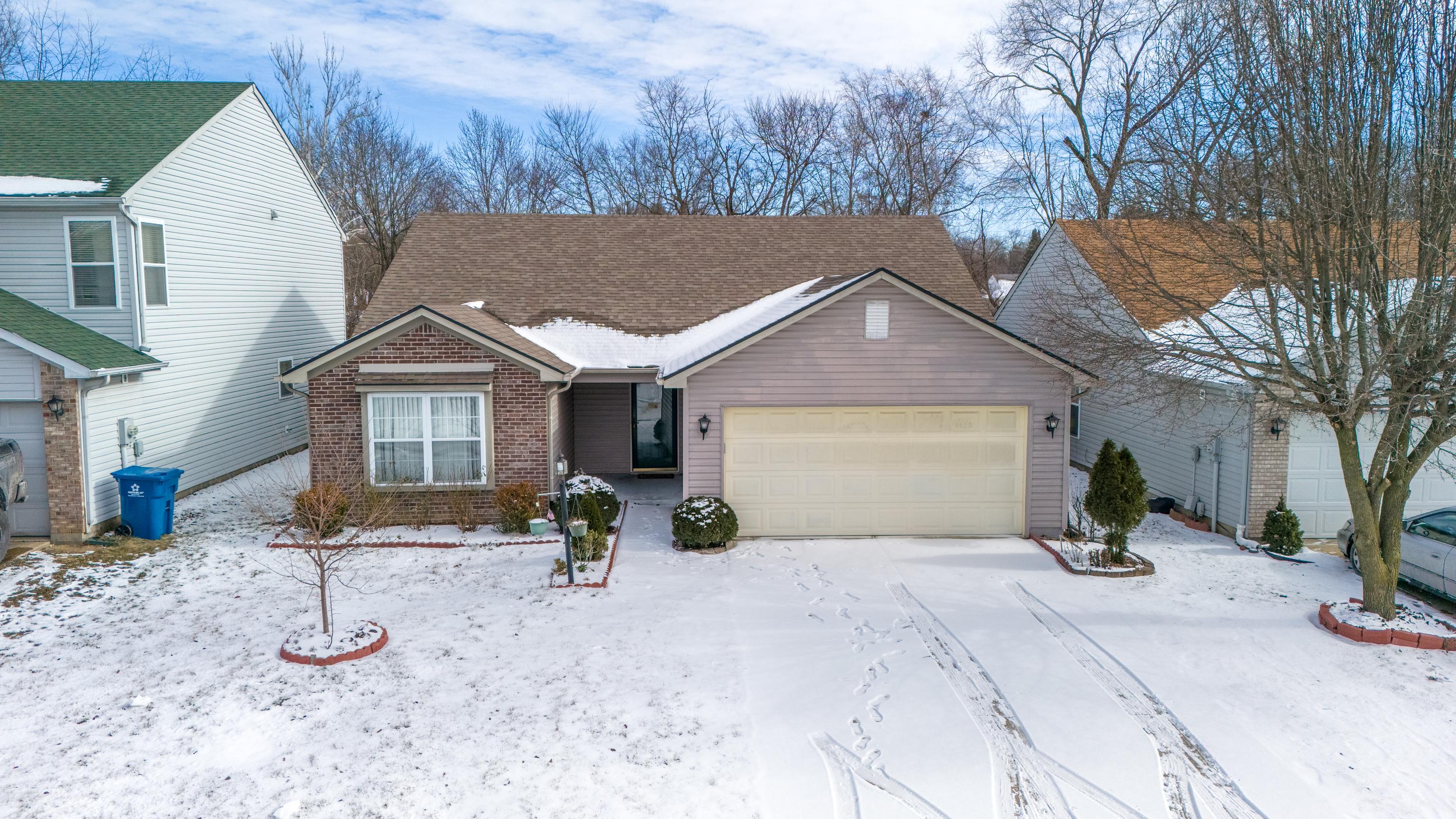 Photo one of 8125 Lake Tree Ln Indianapolis IN 46217 | MLS 21960735