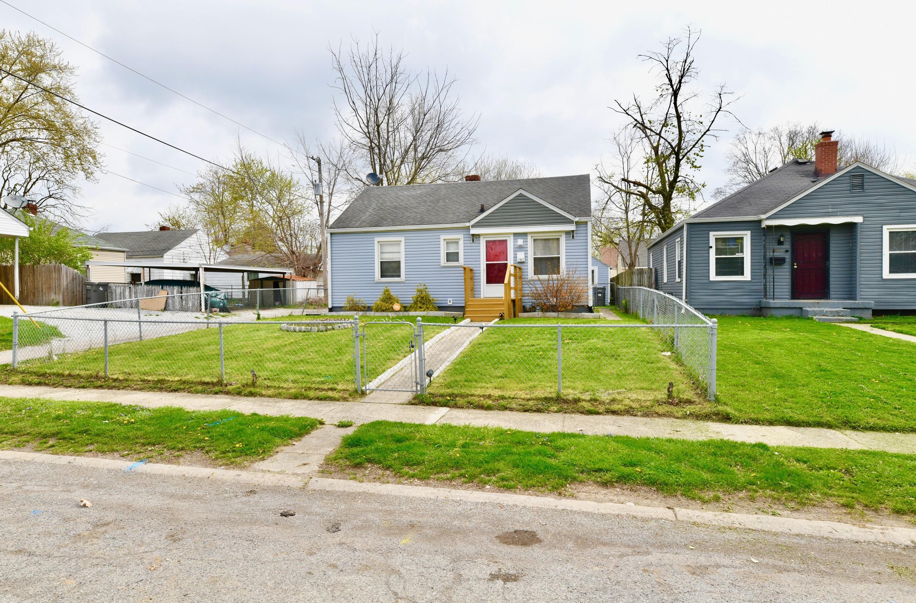 Photo one of 2045 N Linwood Ave Indianapolis IN 46218 | MLS 21973138