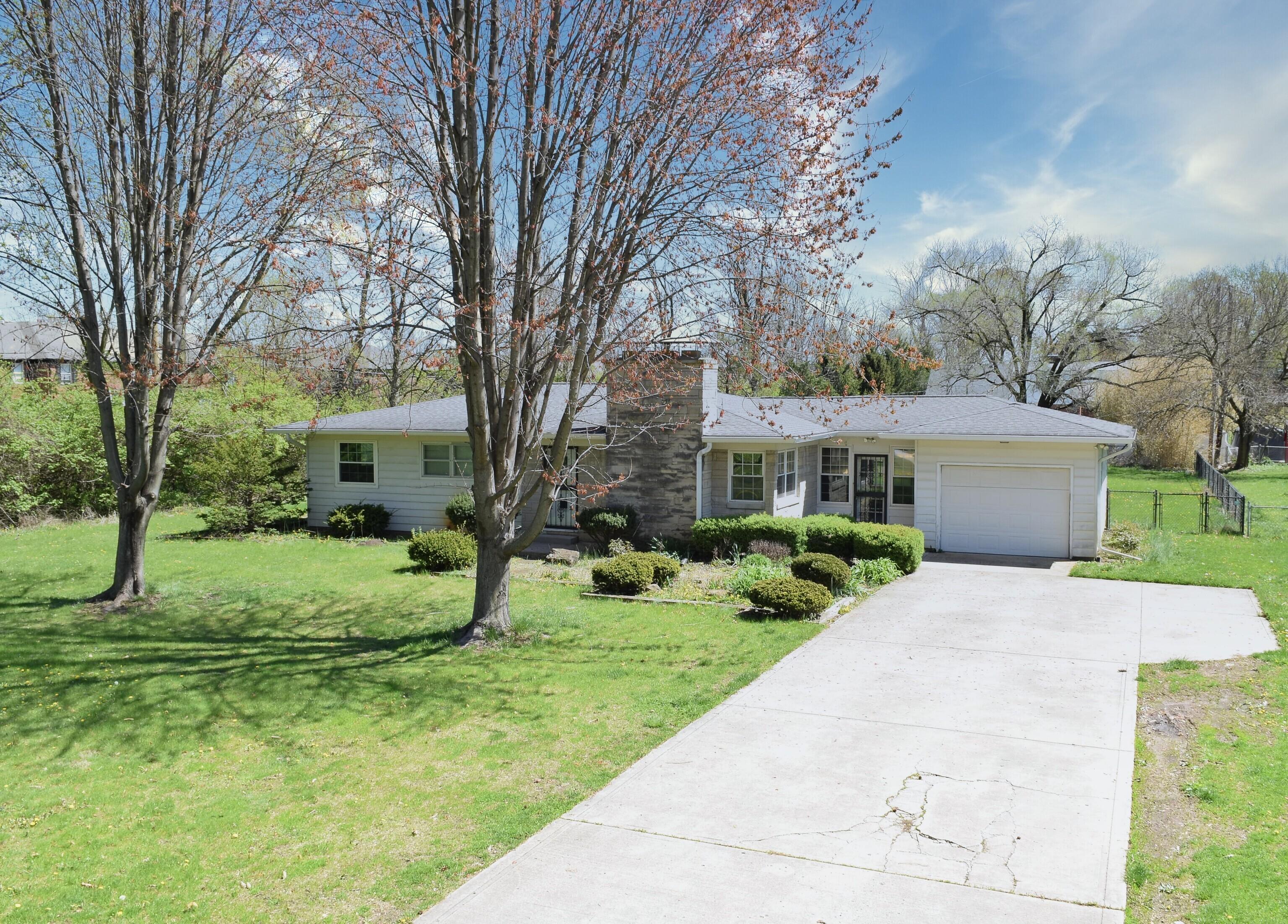 Photo one of 8795 Carrollton Ave Indianapolis IN 46240 | MLS 21973952