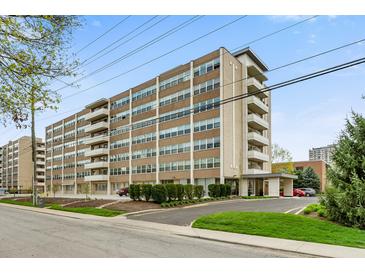 Modern apartment building with ample parking and landscaping at 3965 N Meridian St # Apt 2G, Indianapolis, IN 46208