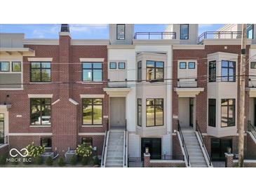 Modern brick townhouses with private entrances and landscaping at 675 E 16Th St, Indianapolis, IN 46202