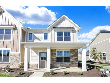 Two-story home with stone accents and a covered porch at 3907 Wren Dr, Brownsburg, IN 46112