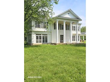 Grand two-story home with white columns and lush green lawn at 1515 S Park Ave, Alexandria, IN 46001