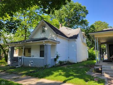 Charming bungalow with gray brick accents at 3310 N Kenwood Ave, Indianapolis, IN 46208